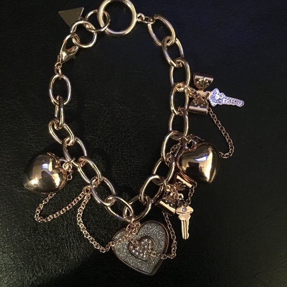Guess Pave Hearts, bows & Keys Rose Gold Bracelet - Picture 2 of 2